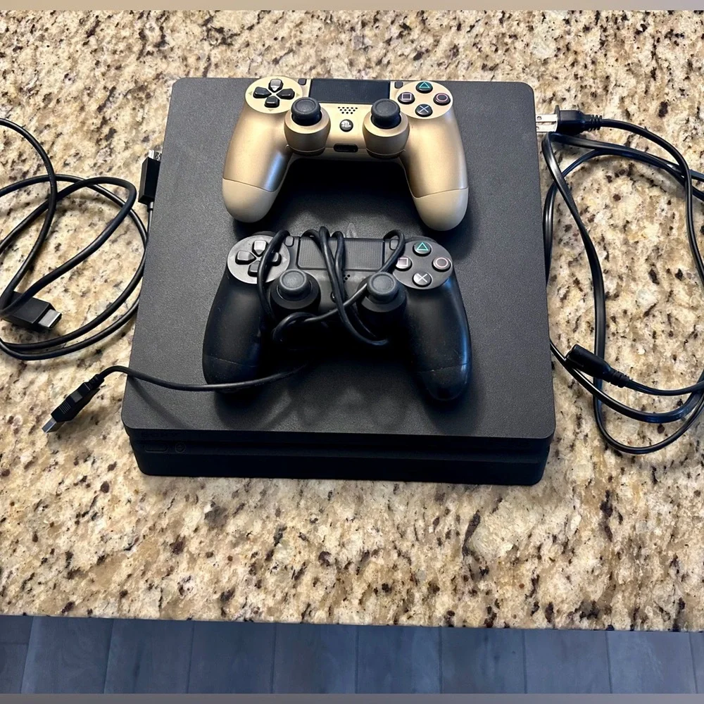 PlayStation PS4 Console with Gold and Black Controllers and 7 Physical Games